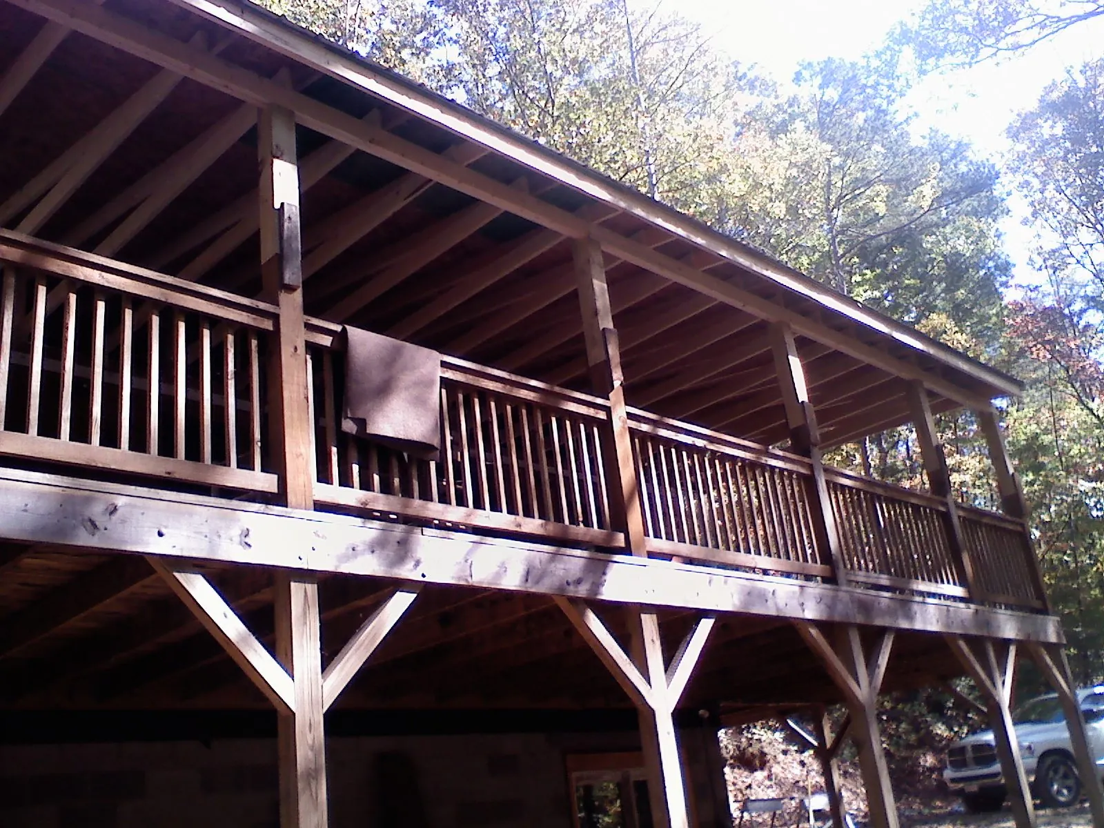 Timber framing under a new elevated porch and deck — Roof Leak Repair in Strafford by Roofing Brothers